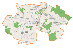 Mapa konturowa gminy Izbica, blisko centrum na lewo u góry znajduje się punkt z opisem „Ostrzyca”