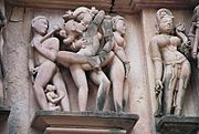 Mithuna or erotic scene from the temple of Khajurāho.