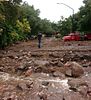 Street filled with rocks and water