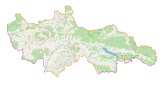 Mapa konturowa powiatu nowotarskiego, w centrum znajduje się punkt z opisem „QWS”