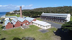 A red brick building and a limestone building at Point Nepean Quarantine