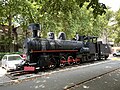 An old locomotive in front of the former train station