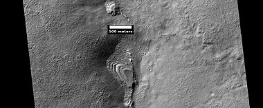 Layered feature probably formed by the erosion of the upper plains unit, as seen by HiRISE under HiWish program