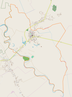 Mapa konturowa Wiślicy, blisko centrum u góry znajduje się punkt z opisem „Dom Długosza”