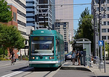 Portland Streetcar tram, with the logos of both Škoda and Inekon on the front