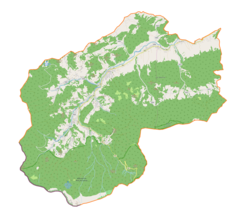 Mapa konturowa gminy Zawoja, na dole po lewej znajduje się punkt z opisem „źródło”, natomiast po lewej znajduje się punkt z opisem „ujście”