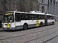 Number 08 3 waits for passengers at the trolleybus stop near Saint Nicholas' Church, Ghent.