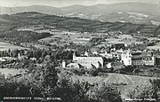 Black and white photograph of the abbey and surrounding area