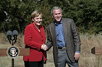 photograph of Merkel and Bush