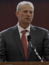 Alabama football coach Kalen DeBoer speaks at a spring assembly, 2024