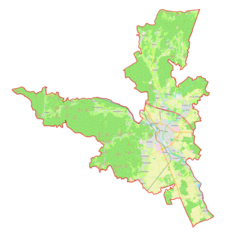 Mapa konturowa gminy miejskiej Kranj, blisko centrum na prawo znajduje się punkt z opisem „Bauhenk”