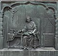 Relief von Raphael Christen auf dem Denkmal des Père Girard in Freiburg i. Üe.