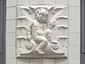 Putto-Fliese als Wandschmuck