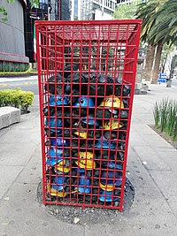 Multiple helmets are enclosed and buried by coal rocks