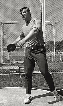 Oerter holding a discus