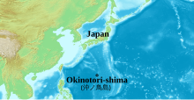 A map showing Okinotorishima's location in relation to mainland Japan. It is located considerably south of it, approximately equal to the atoll's distance with the Philippines visible far to its southwest. Visible far to its northeast are the Ryukyu Islands and somewhat far to its east the arc forming the Mariana Islands. It is due almost exactly south of the Japanese city of Osaka.