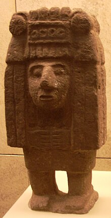 A statue of the Aztec deity Chicomecoatl.