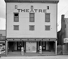 Photograph of the Romney movie theater later used as a Ben Franklin Store