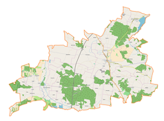 Mapa konturowa gminy Żarnów, blisko centrum na prawo u góry znajduje się punkt z opisem „Odrowąż”