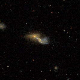 NGC 4837-2 (linksboven)