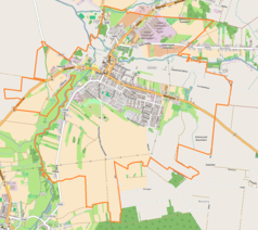 Mapa konturowa Praszki, po lewej nieco u góry znajduje się punkt z opisem „Praszka”