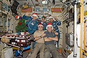 Crewmembers celebrating Christmas in Zvezda