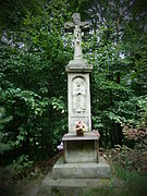 19th century stone shrine of Christ Crucified