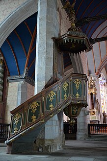 The pulpit in the church of St Suliau. This pulpit ("chaire à prêcher") dates to 1784 and is the work of Yves Cevaer.