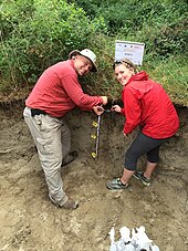 Weindorf conducting research with a student in Central Italy, 2014