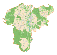 Mapa konturowa gminy Osjaków, blisko centrum na lewo znajduje się punkt z opisem „Raducki Folwark”