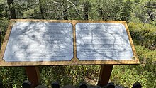 A sign with information at the Vavatsinia Beehive trail.