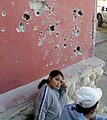 Beersheba, Israel. Holes in resident walls, after a missile attack 20 meters away.