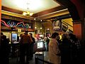 Coolidge Corner Theatre lobby with Art Deco neon