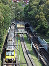 A Tangara train heads for Bondi Junction through the abandoned Woollahra station in 2007