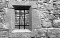 Window with medieval inscription