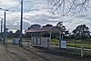 Baxter station viewed from a patch of grass near the station