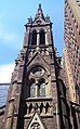 The steeple of the Church of St. John the Baptist (1872) in Manhattan, New York City