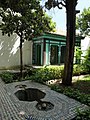 A fountain and menzeh (observation pavilion) in the courtyard garden of the palace