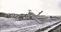 Excavateur aan het werk aan het Wilhelminakanaal te Son. Links erachter de stoomlocomotief. Foto 1919.