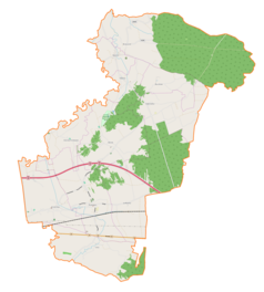 Mapa konturowa gminy Rzezawa, blisko centrum u góry znajduje się punkt z opisem „Dąbrówka”