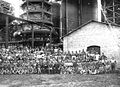 Workers surrounding a furnace soon after its inauguration