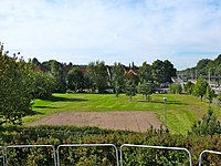 Karlsrofältet in 2013, the memorial stone is located in the far right end of the field.