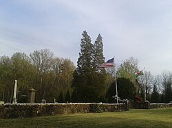 Arvonia's cemetery flies the American and Welsh flags