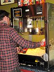 Popcorn being served in Coolidge Corner Theatre lobby