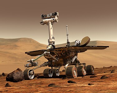 Bir sanatçının Mars Exploration Rover araçlarından birini Mars yüzeyinde canlandırması. 2003'te başlayan Mars Exploration Rover programı kapsamında şimdiye kadar Spirit ve Opportunity araçları uzaya gönderildi. (Üreten: Maas Digital LLC)