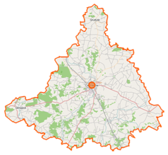 Mapa konturowa powiatu ciechanowskiego, w centrum znajduje się ikonka wieży z opisem „Wieża ciśnień w Ciechanowie”