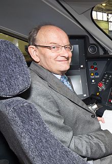 Roger Ford in the cab of 800002 at North Pole Train Maintenance Centre, 2015