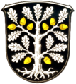 Wappen von Okriftel (Hessen) mit Laub, Eicheln und Wurzel
