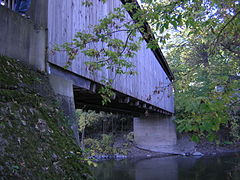 Underside view, showing truss ends protruding from the sheathing.