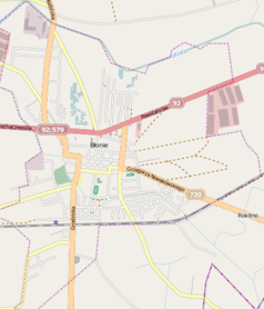 Mapa konturowa Błonia, w centrum znajduje się punkt z opisem „Parafia pw. Narodzenia Pańskiego w Błoniu”